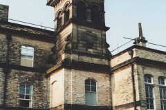 Clock_Tower_with_left_admin_dept__Right_supplies_dept__Left___Right_Buildings_Gutted_Ready_for_Demolition_sm