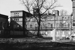 Part_of_Original_Building_-_Red_Brick_building_on_top_is_lift_machinery_housing_clock_tower_in__the_background_April_2002_edit_sm